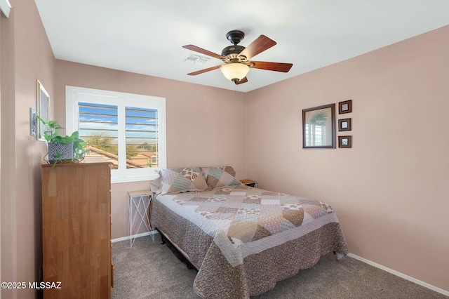 bedroom featuring a ceiling fan, baseboards, visible vents, and carpet