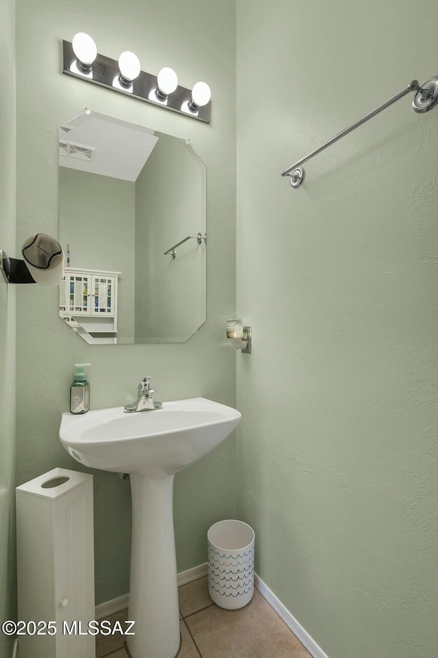 bathroom with tile patterned flooring and visible vents