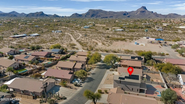 drone / aerial view with a mountain view and a residential view