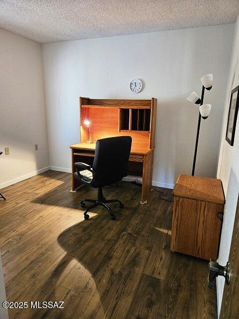 341 W Rio-Santa Cruz, Green Valley, AZ 85614 - office area with wood finished floors, a textured ceiling, and baseboards