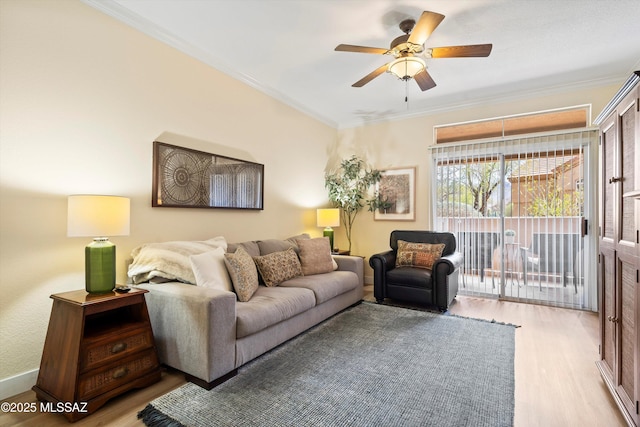 7050 E Sunrise Dr Unit 1104, Tucson, AZ 85750 - living area featuring light wood finished floors, ceiling fan, and crown molding