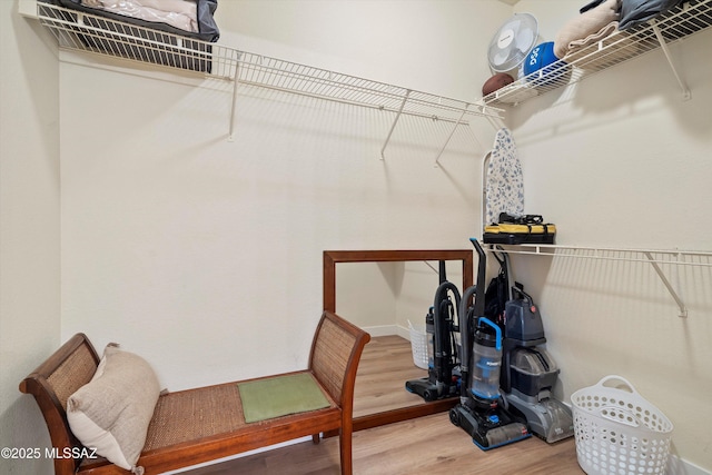 7050 E Sunrise Dr Unit 1104, Tucson, AZ 85750 - walk in closet featuring wood finished floors