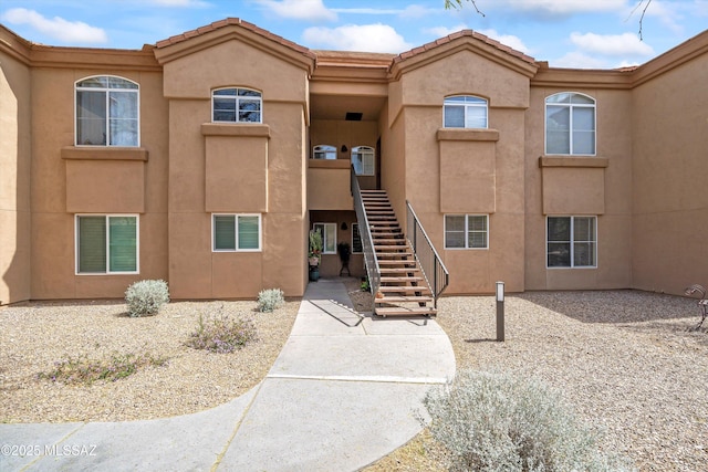 7050 E Sunrise Dr Unit 1104, Tucson, AZ 85750 - view of building exterior with stairs