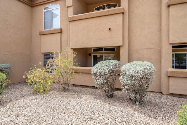 7050 E Sunrise Dr Unit 1104, Tucson, AZ 85750 - property entrance with stucco siding