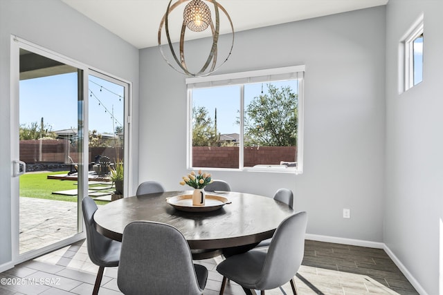 7415 W Cactus Flower Pass, Marana, AZ 85658 - dining room featuring baseboards