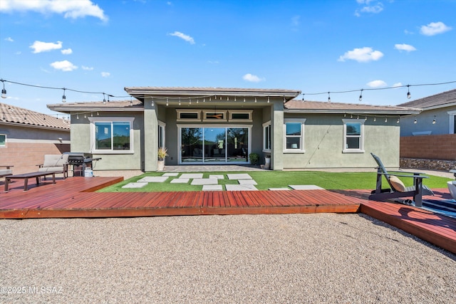 7415 W Cactus Flower Pass, Marana, AZ 85658 - back of property featuring stucco siding and a wooden deck