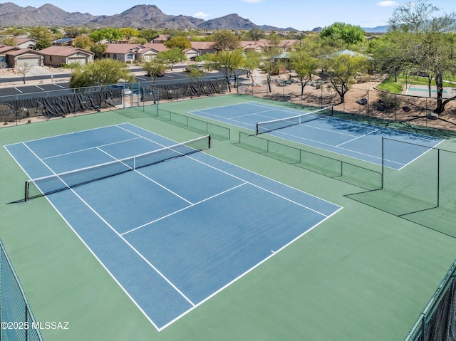 7415 W Cactus Flower Pass, Marana, AZ 85658 - view of tennis court with a mountain view and a residential view