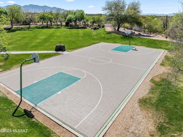 7415 W Cactus Flower Pass, Marana, AZ 85658 - view of basketball court featuring community basketball court, a yard, and a mountain view