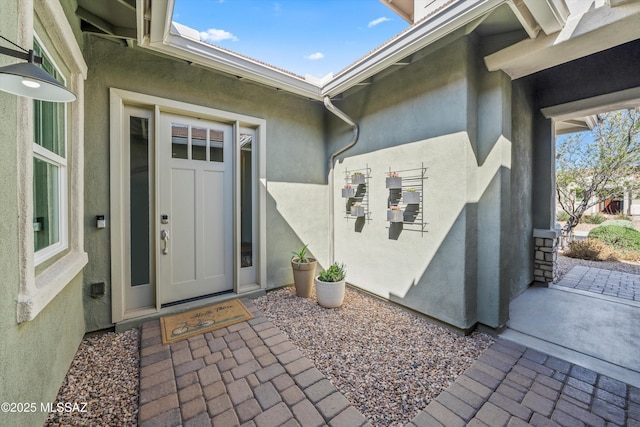 7415 W Cactus Flower Pass, Marana, AZ 85658 - doorway to property with stucco siding
