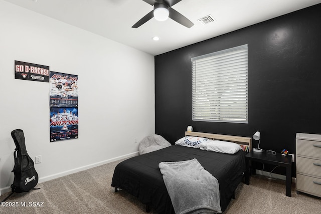 carpeted bedroom featuring recessed lighting, visible vents, baseboards, and a ceiling fan