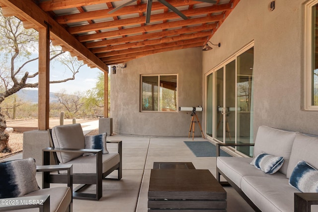 view of patio with a mountain view and an outdoor hangout area