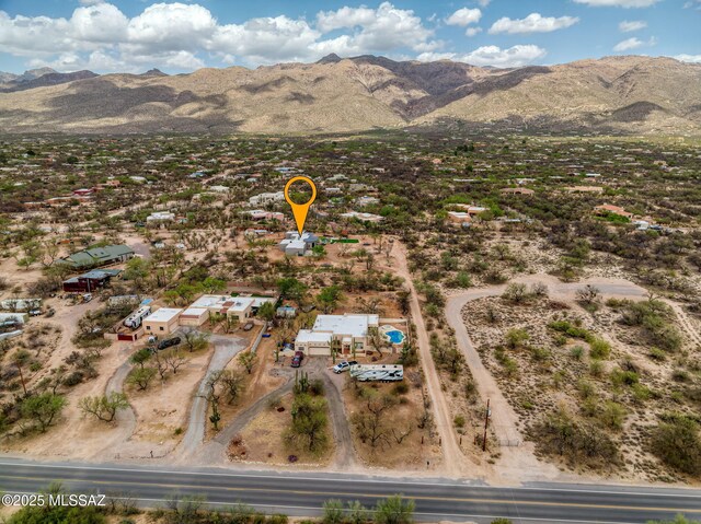 drone / aerial view featuring a mountain view