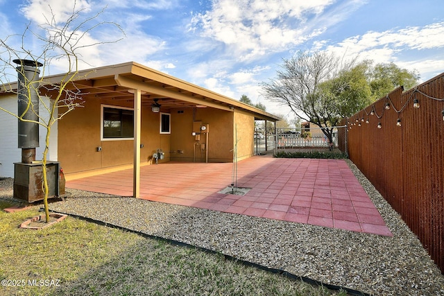 view of patio featuring fence