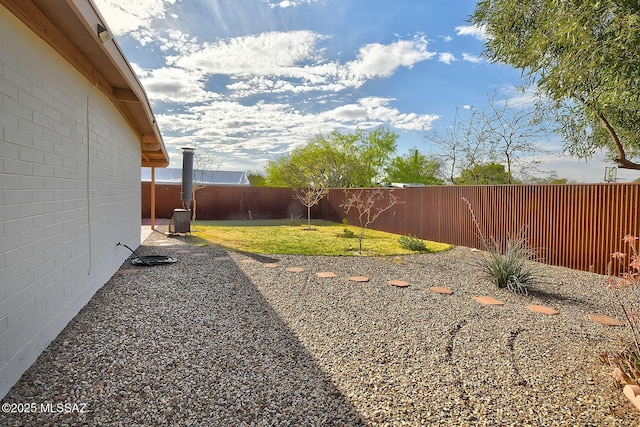 view of yard featuring a fenced backyard