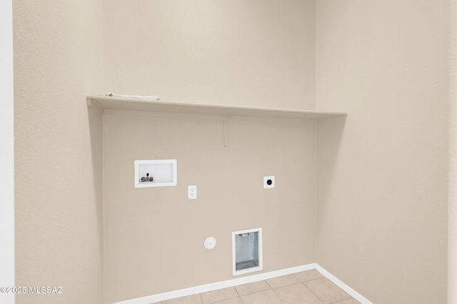 laundry area with light tile patterned flooring, visible vents, hookup for a washing machine, laundry area, and hookup for an electric dryer