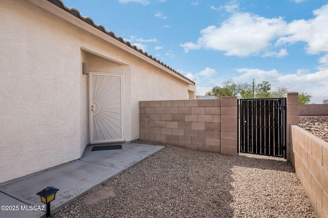 view of yard featuring a gate and fence