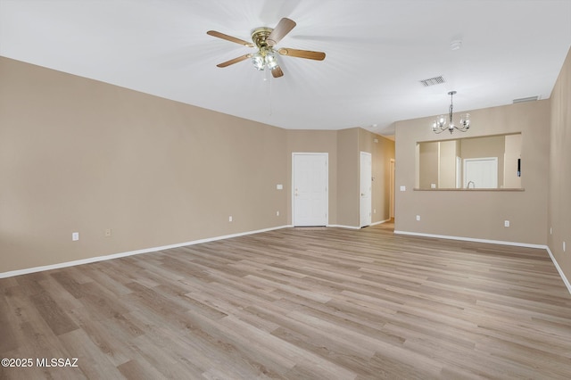 unfurnished living room featuring baseboards, visible vents, light wood-type flooring, and ceiling fan with notable chandelier