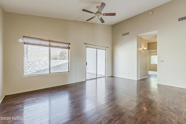 2525 N Camino Reloj, Green Valley, AZ 85614 - empty room with ceiling fan and dark wood-style flooring