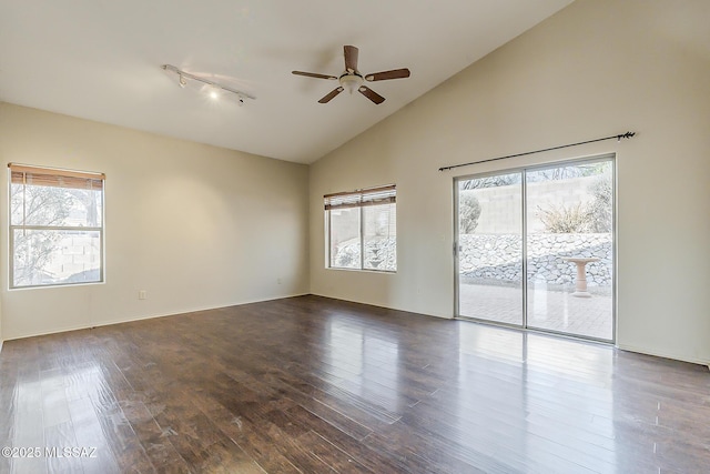 2525 N Camino Reloj, Green Valley, AZ 85614 - empty room featuring ceiling fan, track lighting, high vaulted ceiling, and wood finished floors