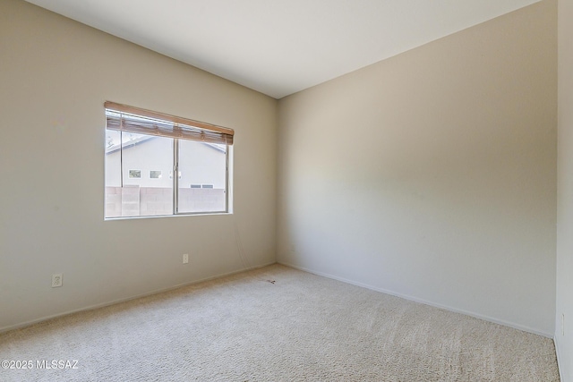 2525 N Camino Reloj, Green Valley, AZ 85614 - spare room featuring carpet floors and baseboards