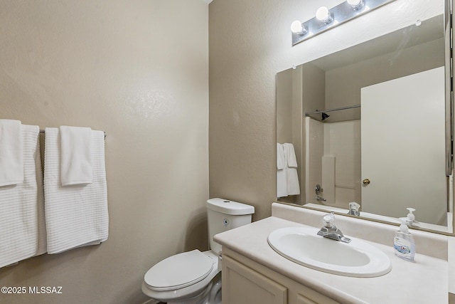 2525 N Camino Reloj, Green Valley, AZ 85614 - full bathroom with toilet, vanity, a shower, and a textured wall