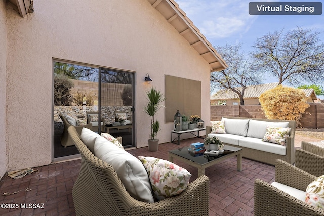 2525 N Camino Reloj, Green Valley, AZ 85614 - view of patio featuring an outdoor living space and fence