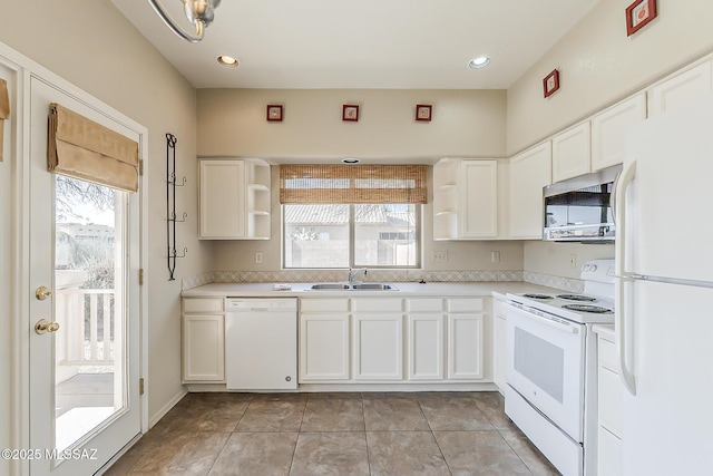 2525 N Camino Reloj, Green Valley, AZ 85614 - kitchen featuring white appliances, open shelves, a sink, white cabinets, and recessed lighting