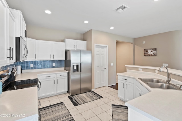 33743 S Ballad Dr, Red Rock, AZ 85145 - kitchen featuring tasteful backsplash, light countertops, visible vents, stainless steel appliances, and a sink