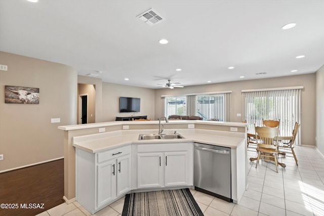 33743 S Ballad Dr, Red Rock, AZ 85145 - kitchen with visible vents, light tile patterned floors, dishwasher, a sink, and open floor plan