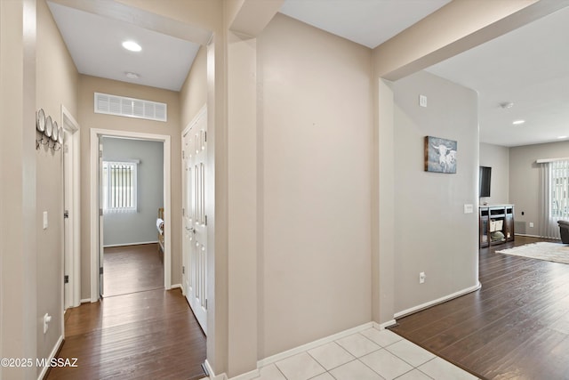33743 S Ballad Dr, Red Rock, AZ 85145 - hallway featuring recessed lighting, visible vents, baseboards, and wood finished floors