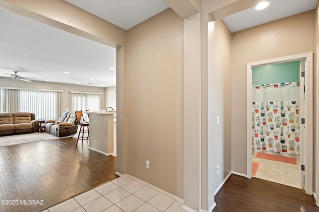 33743 S Ballad Dr, Red Rock, AZ 85145 - hall with wood finished floors, baseboards, and recessed lighting