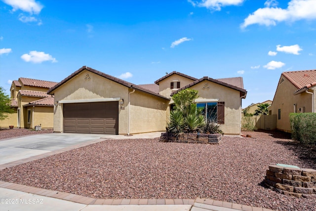 33743 S Ballad Dr, Red Rock, AZ 85145 - mediterranean / spanish home featuring stucco siding, driveway, an attached garage, a tile roof, and fence
