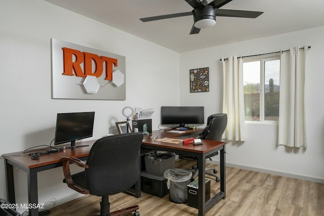 2301 W Montrose Pl, Tucson, AZ 85741 - office space with baseboards, a ceiling fan, and wood finished floors