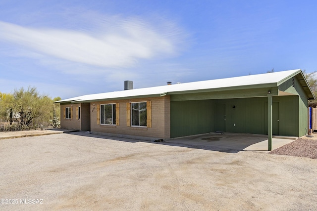 2301 W Montrose Pl, Tucson, AZ 85741 - ranch-style house with an attached carport and driveway