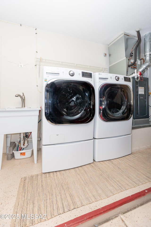 laundry room with laundry area and washer and clothes dryer