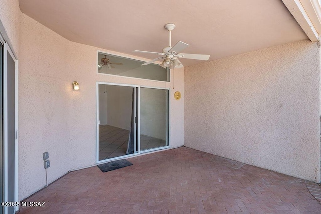 view of patio / terrace with a ceiling fan