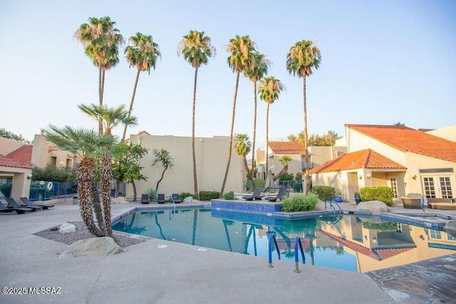 pool featuring a patio