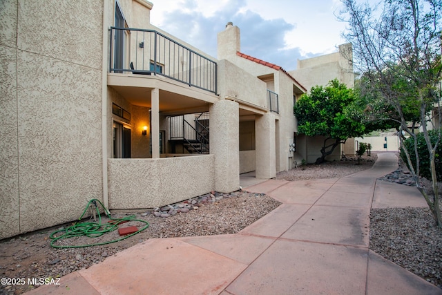 exterior space featuring stairway