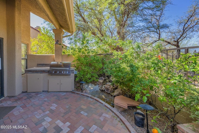 6091 N Golden Eagle Dr, Tucson, AZ 85750 - view of patio featuring fence, a grill, and area for grilling