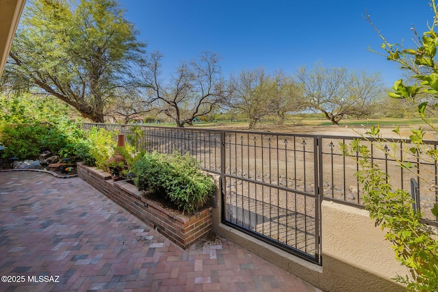 6091 N Golden Eagle Dr, Tucson, AZ 85750 - view of patio / terrace with fence