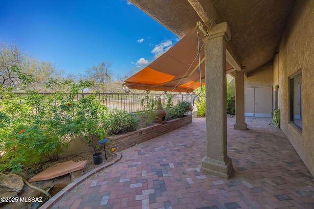 6091 N Golden Eagle Dr, Tucson, AZ 85750 - view of patio / terrace featuring fence