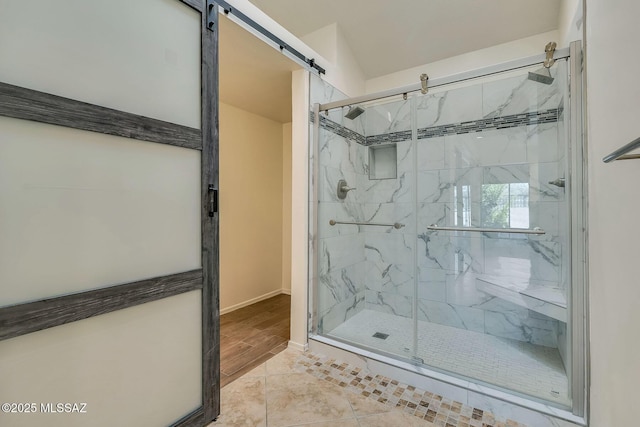 6091 N Golden Eagle Dr, Tucson, AZ 85750 - bathroom with a marble finish shower and baseboards
