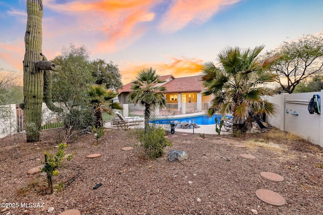 view of pool featuring a fenced backyard and a fenced in pool