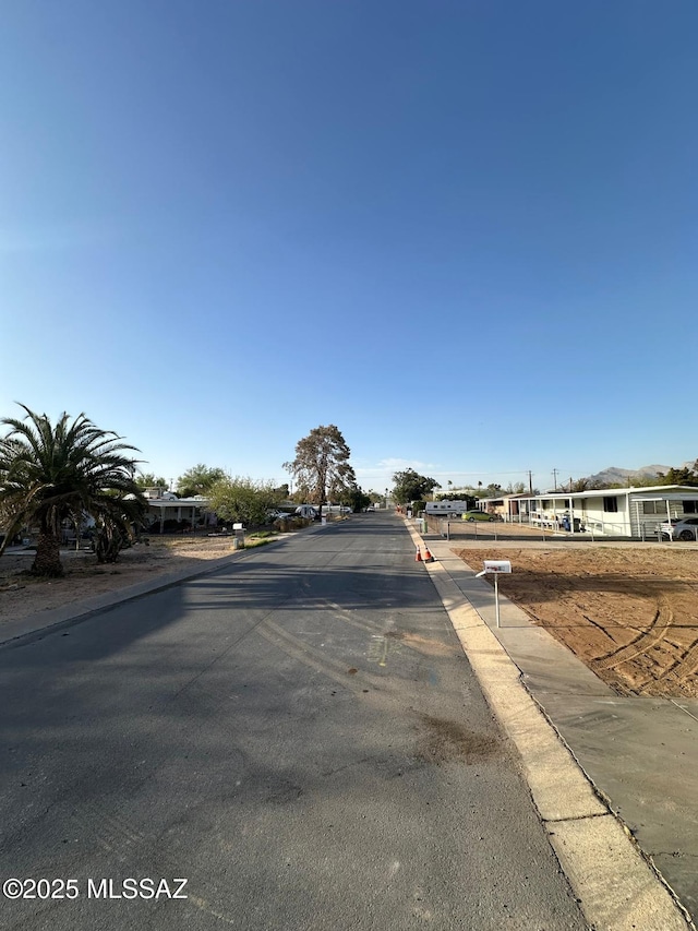 3918 N Midge Ln, Tucson, AZ 85705 - view of road featuring curbs
