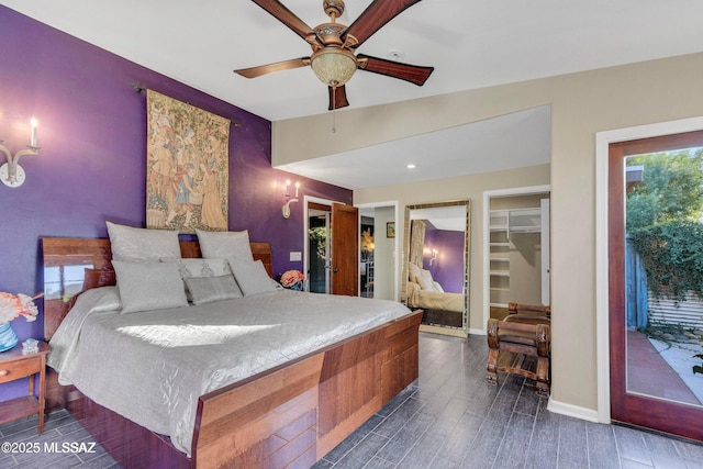 bedroom with vaulted ceiling, a ceiling fan, access to outside, dark wood-style floors, and baseboards