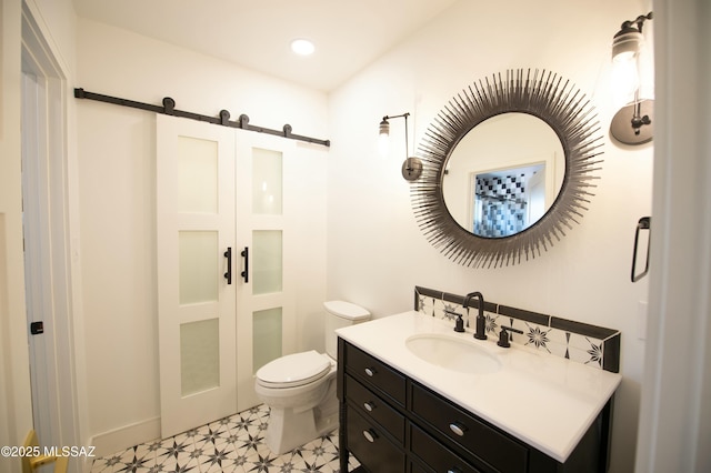 1838 N Campbell Ave, Tucson, AZ 85719 - bathroom featuring recessed lighting, toilet, vanity, and tile patterned floors