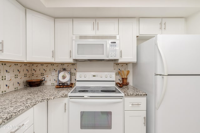 538 N Dodge Blvd, Tucson, AZ 85716 - kitchen with white cabinetry, decorative backsplash, and white appliances