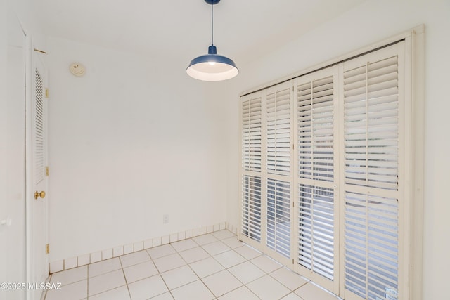 538 N Dodge Blvd, Tucson, AZ 85716 - unfurnished bedroom featuring tile patterned floors and baseboards