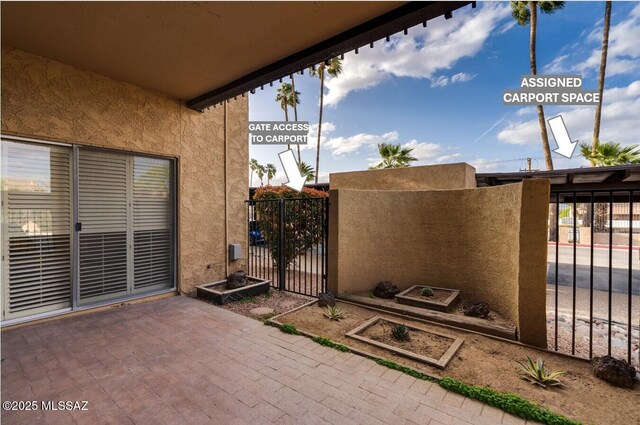 538 N Dodge Blvd, Tucson, AZ 85716 - view of patio / terrace featuring a gate, fence, and a vegetable garden
