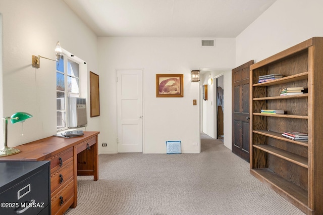 office with light colored carpet and visible vents